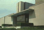 Entrance of National Library of Medicine building, looking southwest, Summer (photograph, 8-bit color, GIF87 format, 99 pixels high, 144 pixels wide, 9745 bytes)