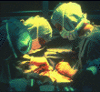 Surgeons at work, NIH clinical center (photograph, 8-bit color, GIF87 format, 101 pixels high, 110 pixels wide, 8072 bytes)